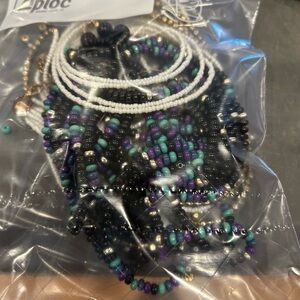 Seed beads from two broken necklaces
